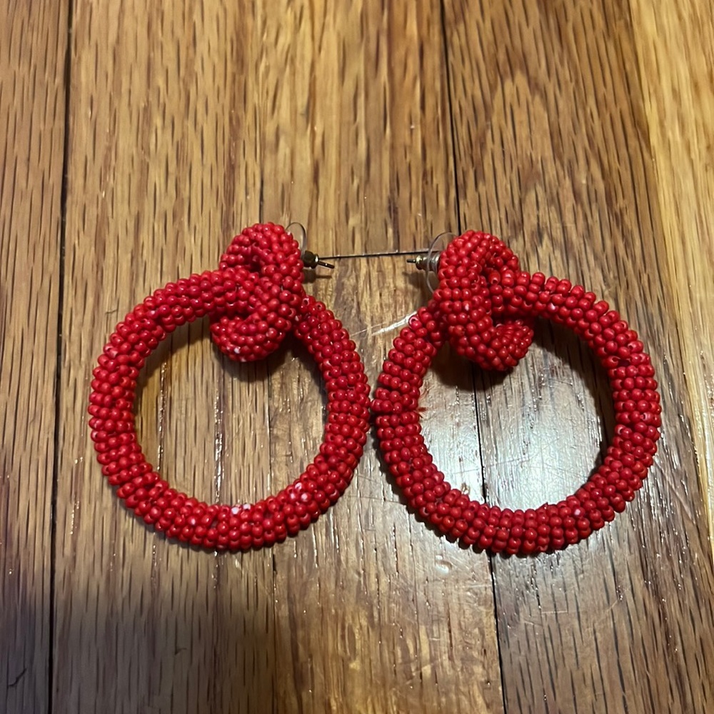 Red hoop earrings